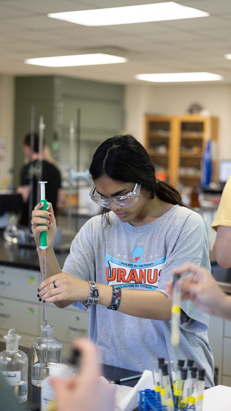 Keuka College Student Performing Lab Experiment